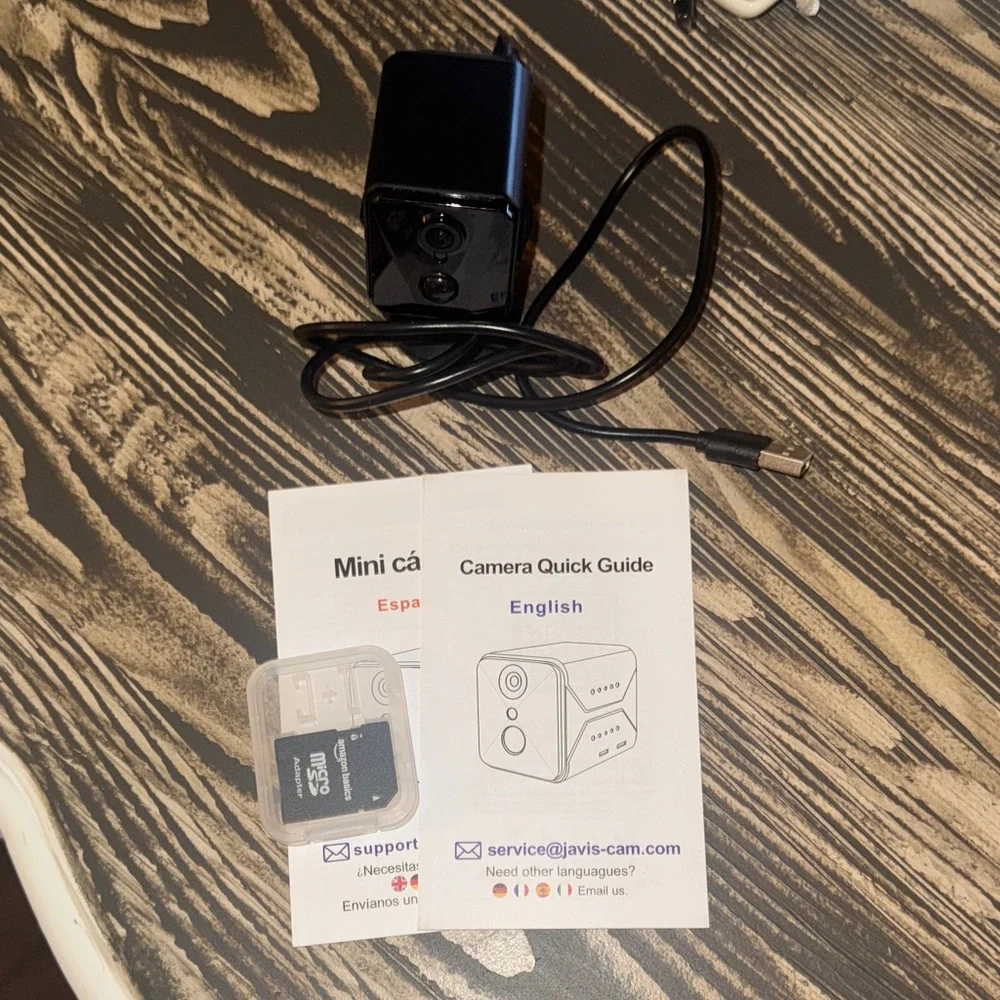 Compact Black Security Camera with Accessories